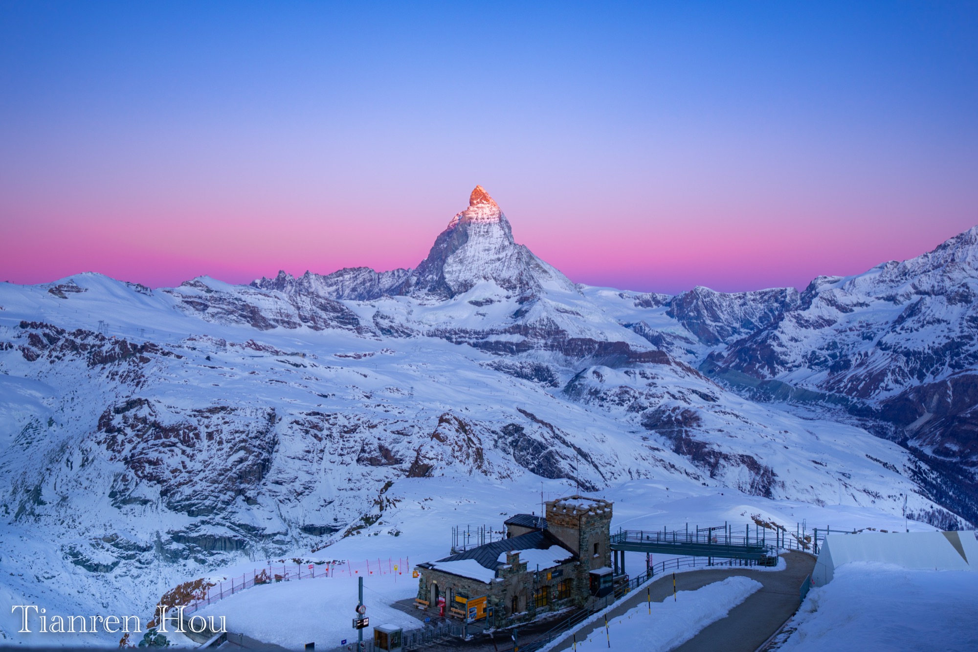 Alpine road through the Swiss mountains at dusk